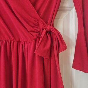 Red romper. Shorts long sleeves.